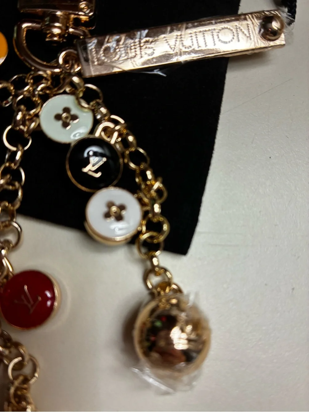 Louis Vuitton stamped Gold-Tone Multicolor Charm Keychain/ bag charmEnamel Discs